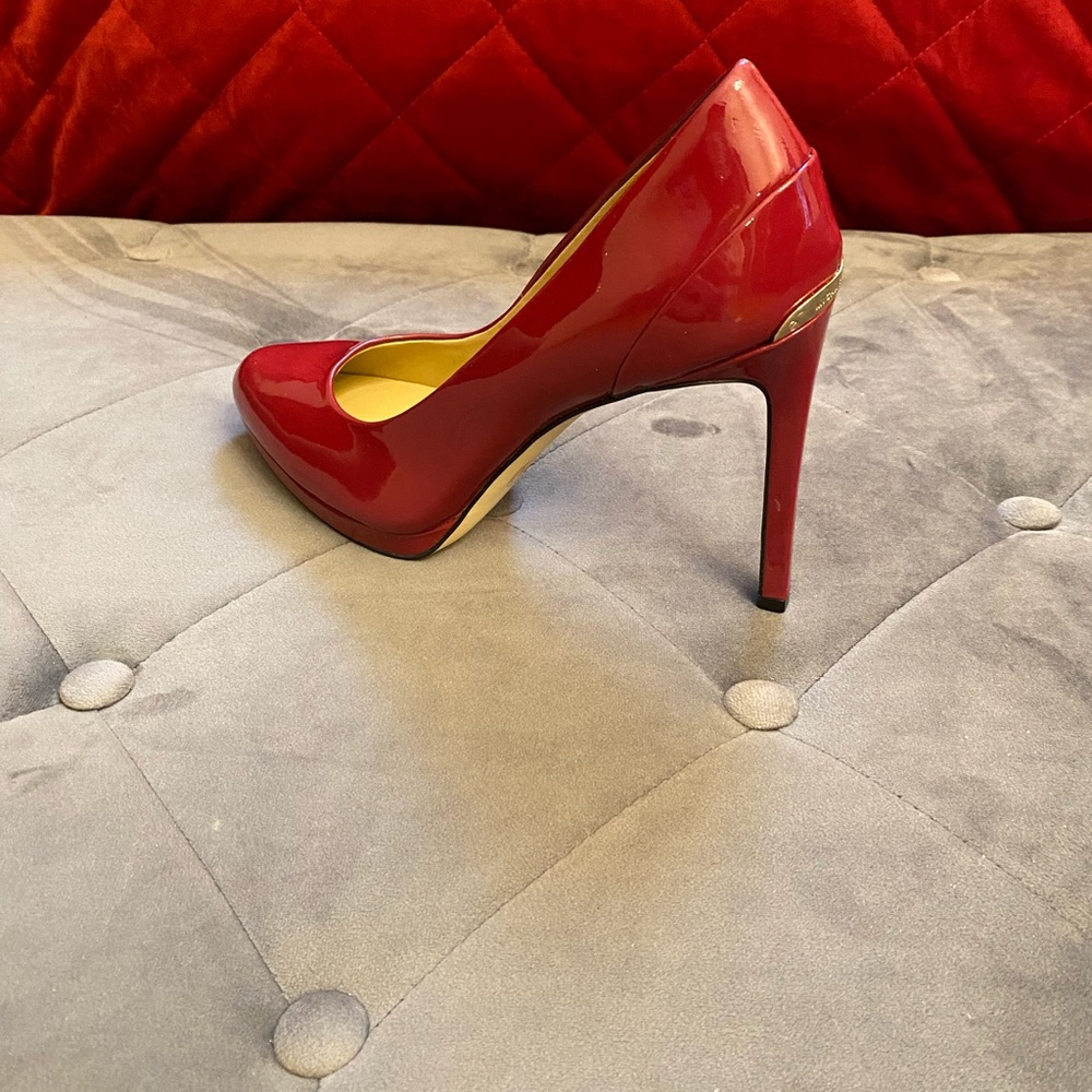 Elegant Red High Heel Women's Shoe. Brand new Michel Kors gorgeous heels.